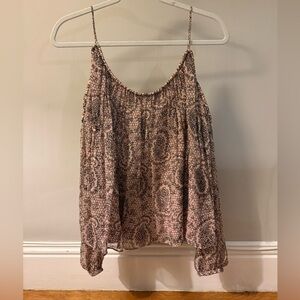 Elizabeth and James size Medium silk blouse. Polyester lining.